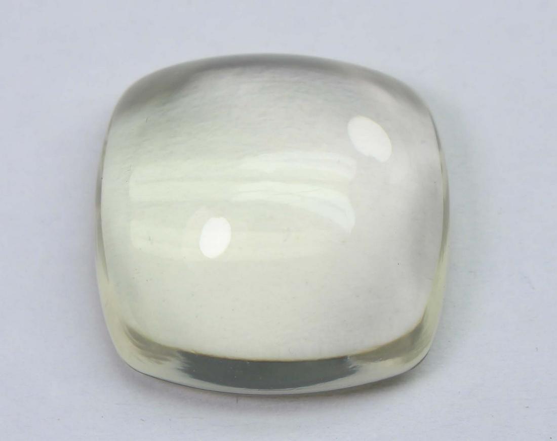 21.48 Cts Natural Lemon Quartz: No Reserve! Title: 21.48 Cts Natural Lemon Quartz Additional Information: Gemstone : Natural Lemon QuartzWeight : 21.48 CtsShape : Square Cushion CabuchonColour : Greenish Yellow Dimensions : 18.4x18.