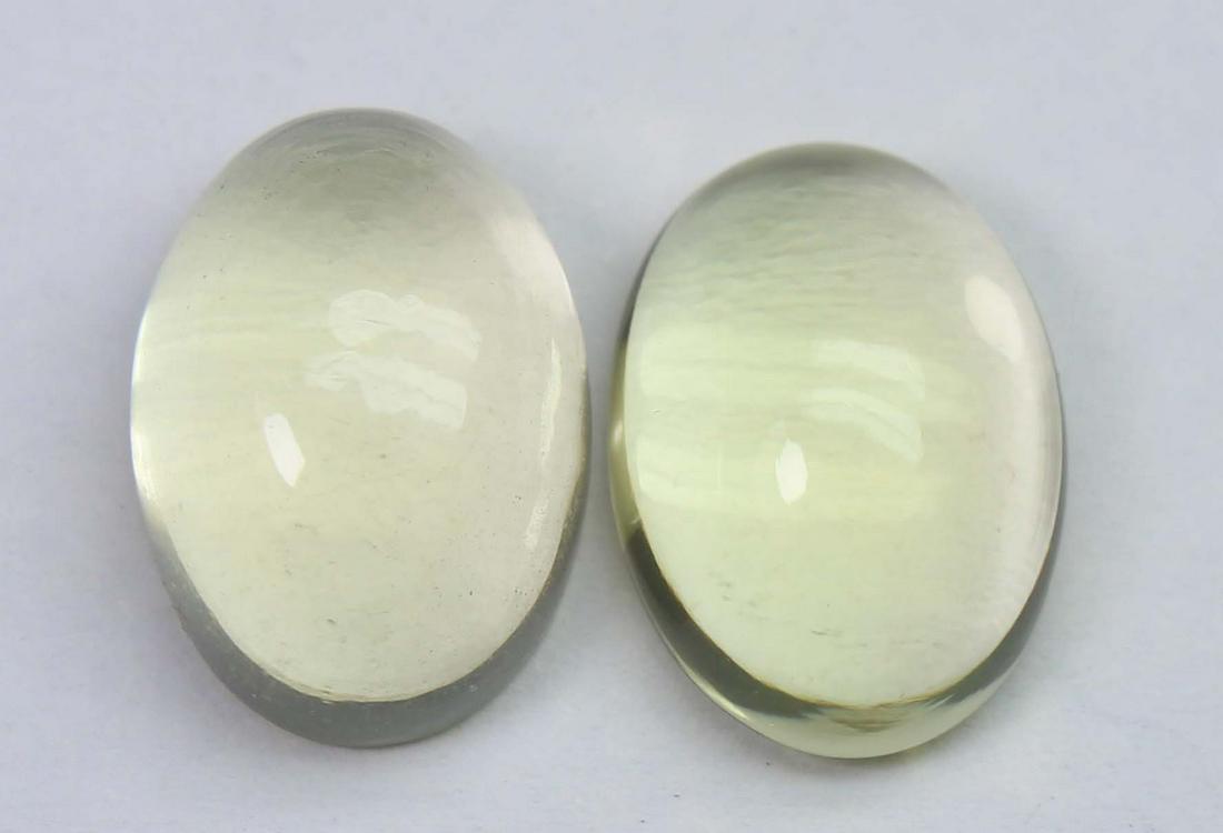 12.99 Cts Natural Lemon Quartz Lot: No Reserve! Title: 12.99 Cts Natural Lemon Quartz Lot Additional Information: Gemstone : Natural Lemon QuartzWeight : 12.99 CtsShape : Oval CabuchonColour : Greenish Yellow Dimensions : 14x10 mm (Cali