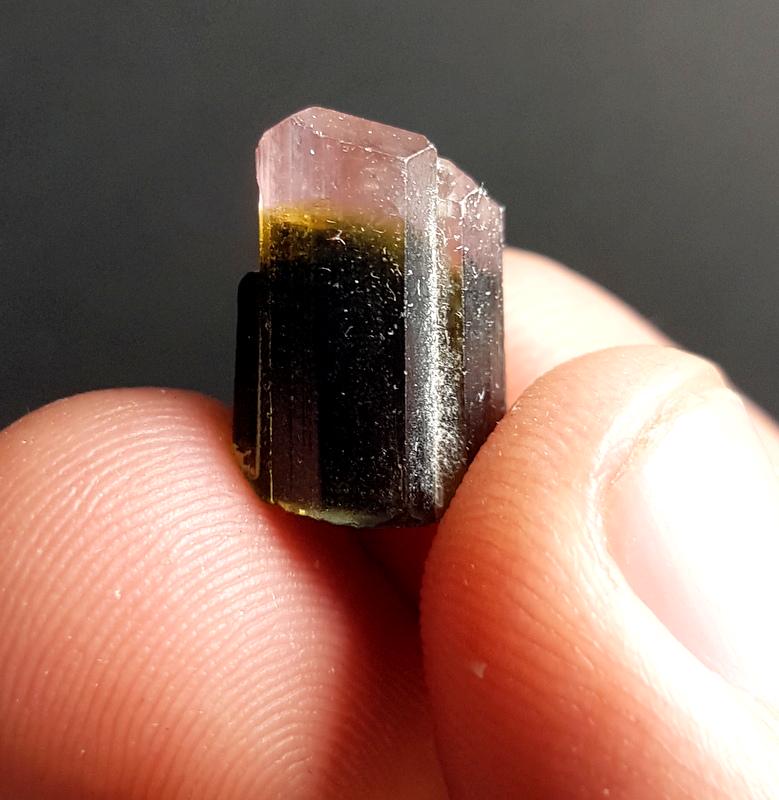 02 Grams Beautiful Pink Cap Tourmaline Crystal Specimen: No Reserve! Title: 02 Grams Beautiful Pink Cap Tourmaline Crystal Specimen From Skardu pakistan Color/Clarity: Pink Gemstone Type: Crystal Size/Dimensions: 15*12*10 mm Shipping: Domestic: Flat-rate of