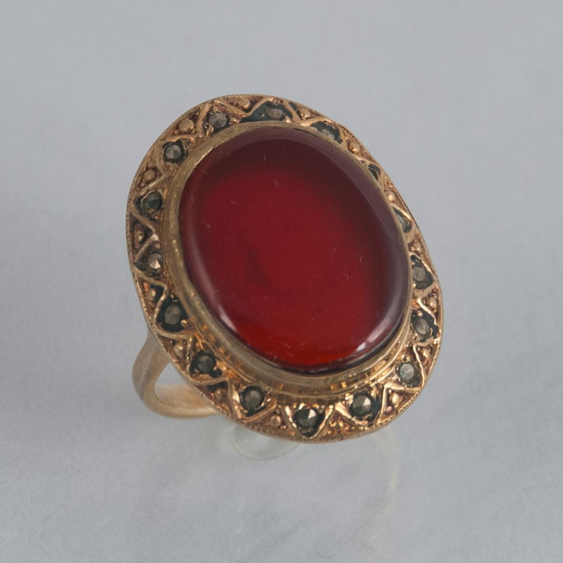 Bronze oval carnelian stone and marksite ring, size 9: Bronze oval carnelian stone and marksite ring, size 9 Reserve: $20.00 Shipping: Domestic: Flat-rate of $25.00 to anywhere within the contiguous U.S. International: Foreign shipping rates are determine