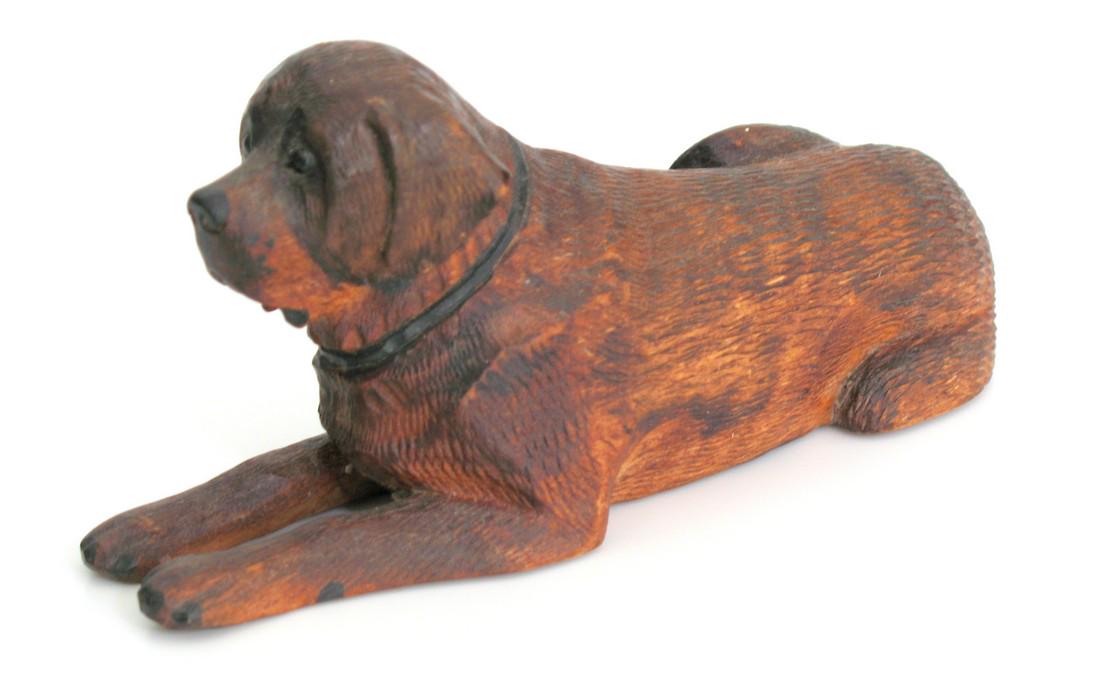 Folk art wood carved dog.: Title: Folk art wood carved dog. Date/Period: 1940's Dimension: 5” x 3 3/4” Description:Nice vintage folk art wood carving of a reclining dog. Shipping: Domestic: Flat-rate of $20.00 to anywhere w