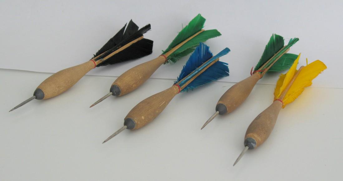 Vintage wood darts.: Title: Vintage wood darts. Date/Period: 1960's Dimension: 7 1/2” long Description:Nice group of vintage wood & turkey feather darts. Shipping: Domestic: Flat-rate of $15.00 to anywhere within the co