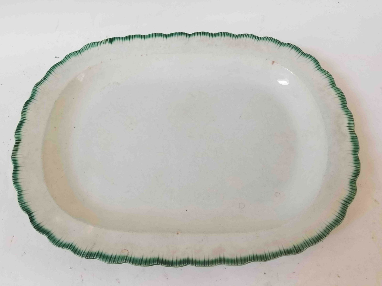 Pearlware platter with green feather edge, c. 1815 (1 of 2)
