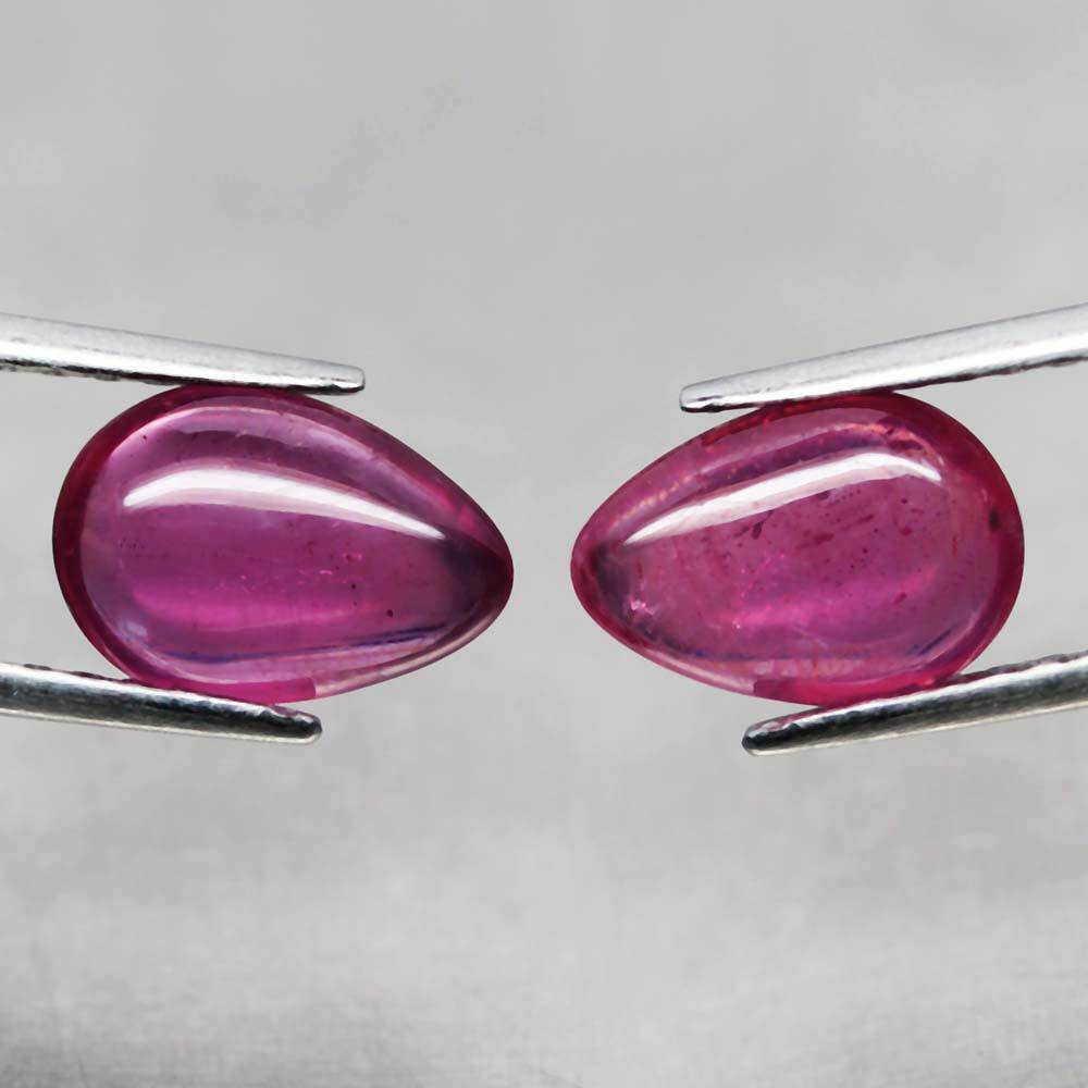 Pear cabochon pinkish red ruby pair (1 of 3)