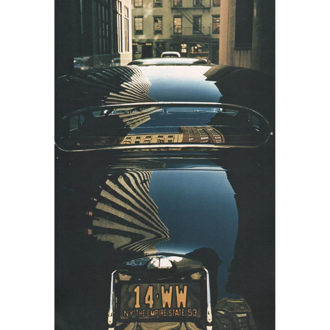 WERNER BISCHOF - Skyscrapers reflected in cars' paint: Artist: WERNER BISCHOF Print Title: Skyscrapers reflected in cars' paint, NY Medium: Color Sheet-fed Gravure Printing Date: 1957 Printed in Switzerland Image Size: 11 x 7.5 inches Werner Bischof (1916