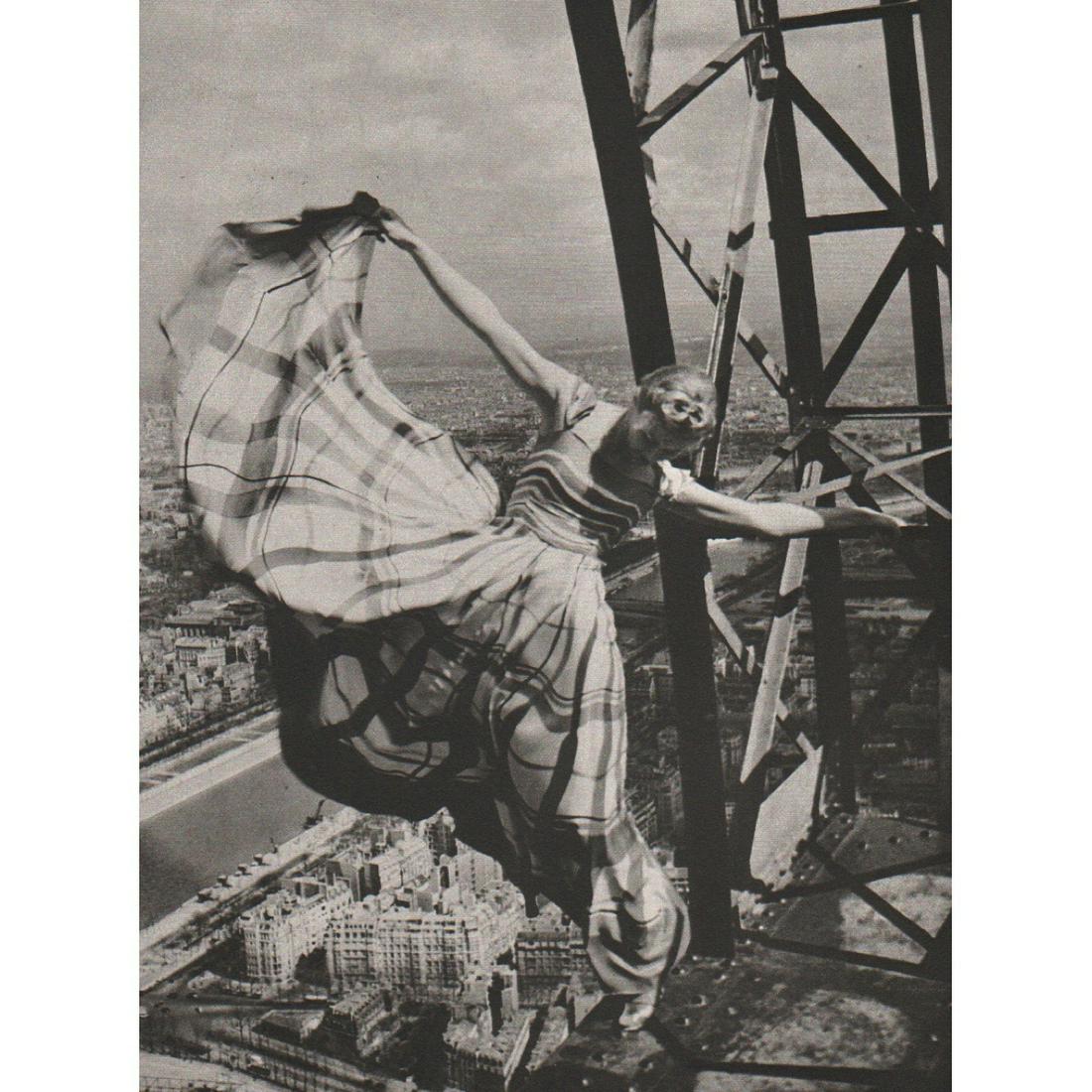 ERWIN BLUMENFELD - Lisa Fonssagrives - Eiffel Tower: Artist: ERWIN BLUMENFELD Print Title:Lisa Fonssagrives on the Eiffel Tower, 1939 Medium: Sheet-fed Gravure Printing Date: 1980's Printed in Italy Image Size: 11.5 x 8.5 inches Erwin Blumenfeld was a G