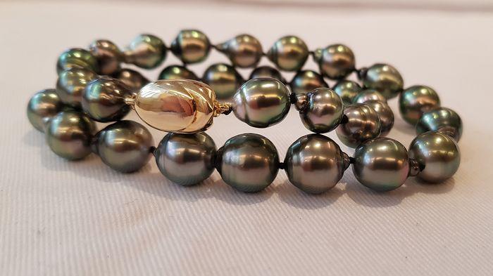 925 Silver - 8.5x11mm Peacock Tahitian Pearls -: This beautiful pearl bracelet features a double row of lustrous Tahitian pearls measuring 8.5x11mm. Emerging from the tropical lagoons of French Polynesia, the pearls have a natural beautiful Tahiti g