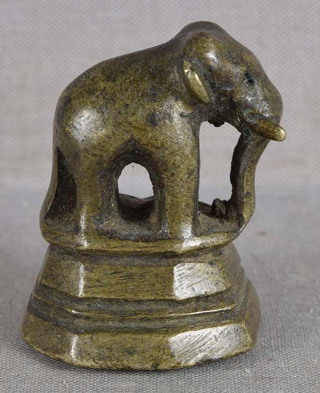 18/19 century Burmese OPIUM WEIGHT ELEPHANT: Small 19th (can be as early as 18th) century Burmese bronze opium weight with the finial cast in a shape of an elephant. Opium weights is a fancy name for an ancient weight system which existed in Bur