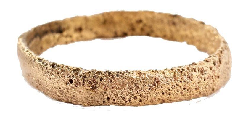 ANCIENT VIKING WOMAN’S WEDDING RING, 10TH-11TH CENTURY: Size 6 3/4. Low rounded band, 3.0mm. Surface textured from burial. Professionally refurbished with the surface restored in 24 karat gold. Gift boxed with certificate of authenticity. Reserve: $60.00 S