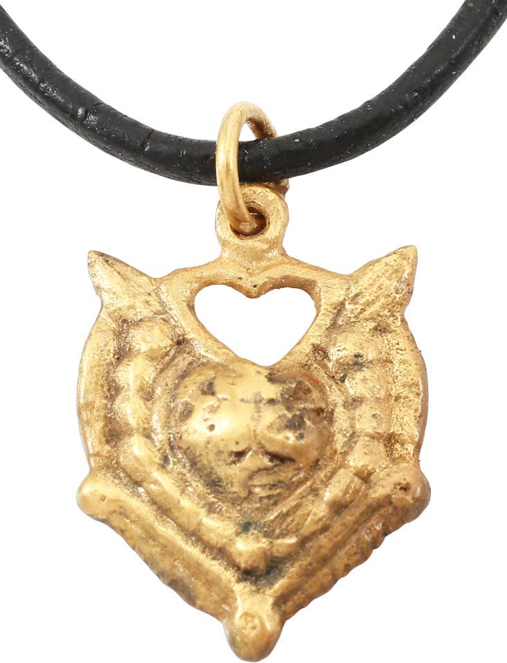 FINE VIKING HEART PENDANT NECKLACE 900-1050 AD JEWELRY: Over 7/8” height, with nubs at the sixth points. Domed form. Central cusped heart with a beaded border and broad edge. The heart is formed with the top cusp shared with the bottom of a pierced heart