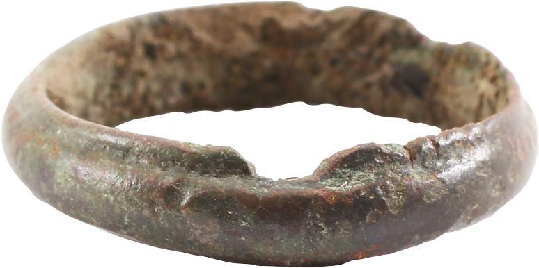 ANCIENT VIKING WEDDING RING, 9TH-10TH CENTURY AD: No Reserve! SIZE 8 ½. Cambridgeshire England. Bronze, originally gilt, size 8 1/2. Broad 4.6mm width with a slightly rounded face. Early construction with the band cast with a central core to distrib
