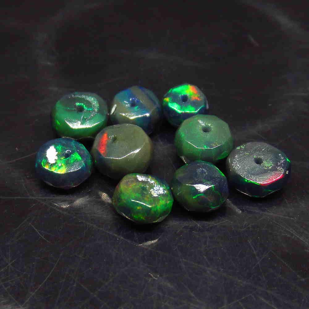 3.30 Ctw Natural 10 Drilled Faceted Black Opal Beads: No Reserve! Title: 3.30 Ctw Natural 10 Drilled Faceted Black Opal Beads Stone Clarity: Translucent Gemstones: Faceted Black Opal Beads Carat Weights: 3.3 Size/Dimensions: 4.00 to 4.90 mm / 10 PC's Add