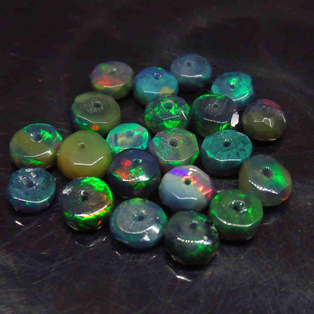 4.50 Ctw Natural 21 Drilled Faceted Black Opal Beads: No Reserve! Title: 4.50 Ctw Natural 21 Drilled Faceted Black Opal Beads Stone Clarity: Translucent Gemstones: Faceted Black Opal Beads Carat Weights: 4.5 Size/Dimensions: 4.00 to 4.60 mm / 21 PC's Add