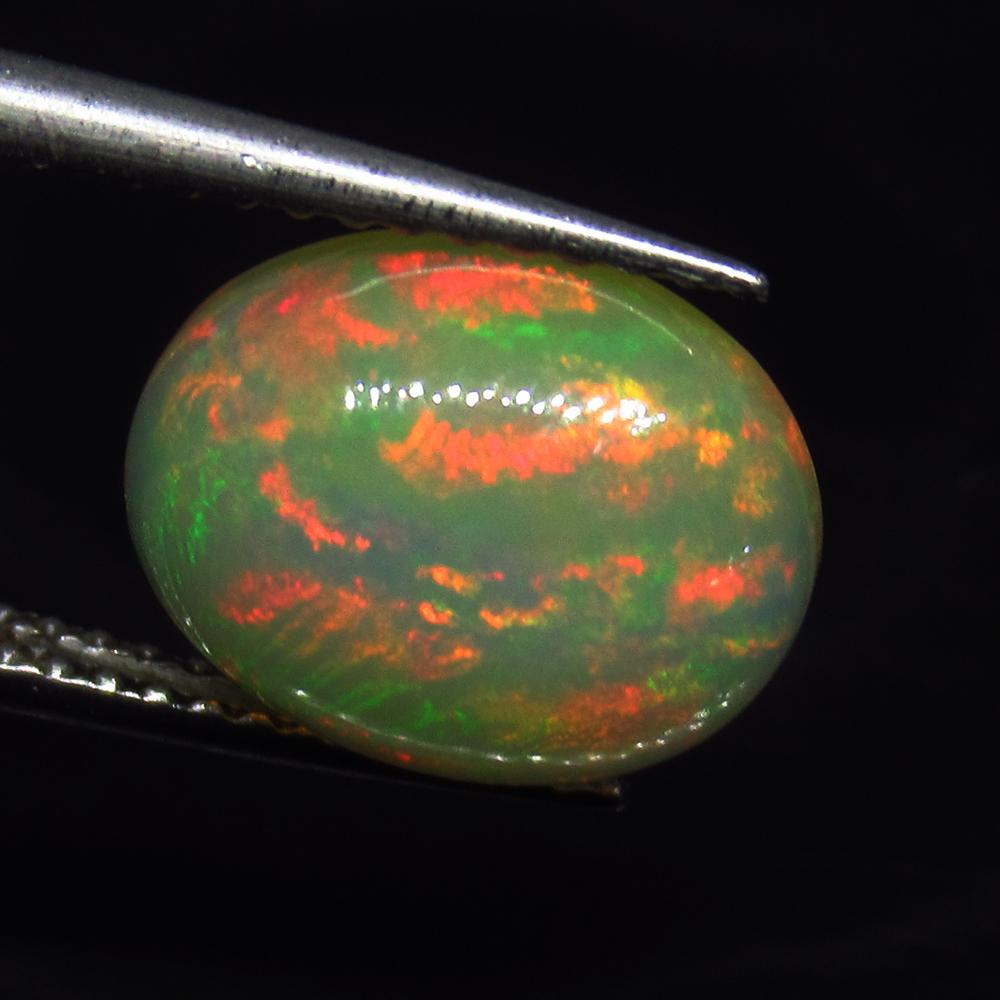 2.55 Ct Natural Ethiopian MultiColor Fire Opal Oval Cab (1 of 2)