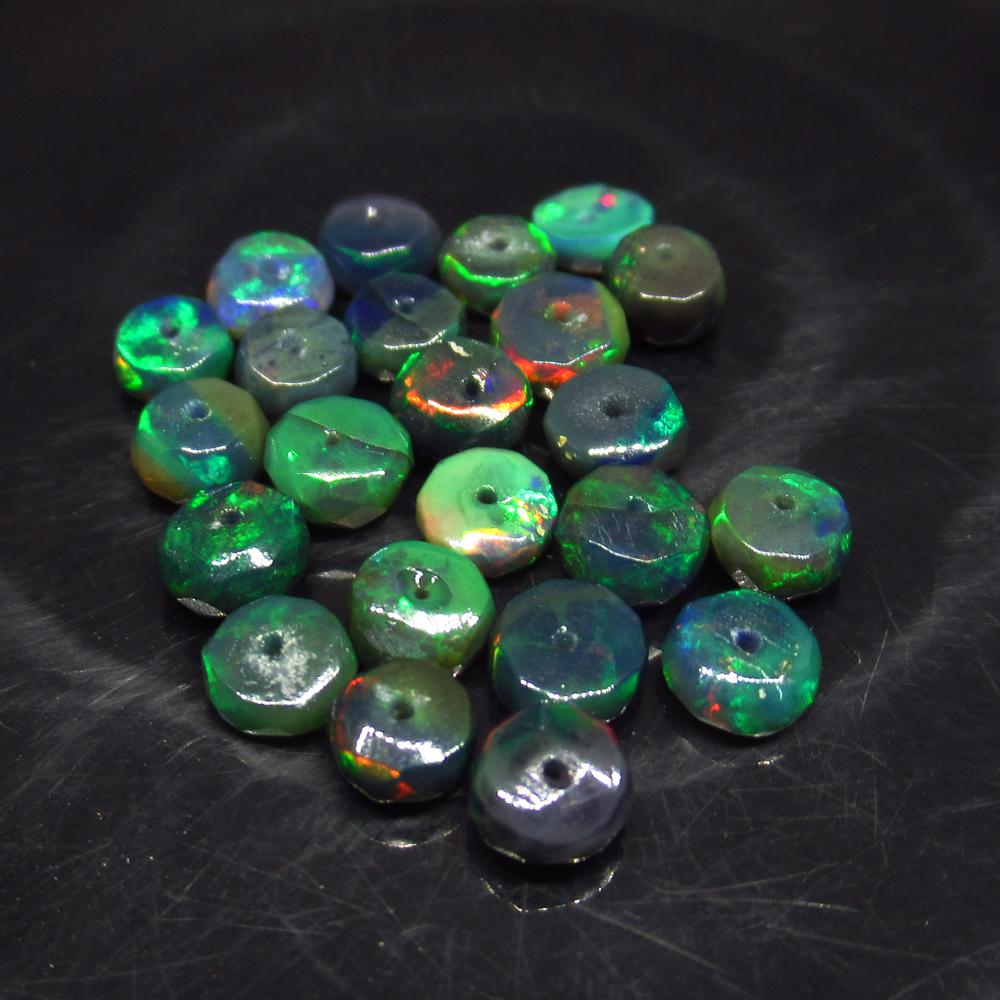 6.81 Ct Natural 23 Drilled Faceted Fire Black Opal: No Reserve! Title: 6.81 Ct Natural 23 Drilled Faceted Fire Black Opal Beads Stone Clarity: Translucent Gemstones: Natural Faceted Black Opal Beads Carat Weights: 6.81 Size/Dimensions: 4.30 to 4.80 mm 
