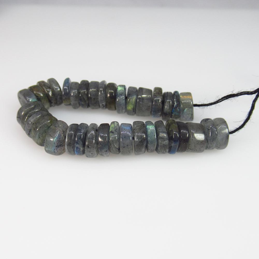 24.21 Ct Natural 36 Drilled Round labradorite Beads: No Reserve! Title: 24.21 Ct Natural 36 Drilled Round labradorite Beads Stone Clarity: SI Gemstones: Natural labradorite Beads Carat Weights: 24.21 Size/Dimensions: 6.30 to 6.60 mm / 36 PC's Additional