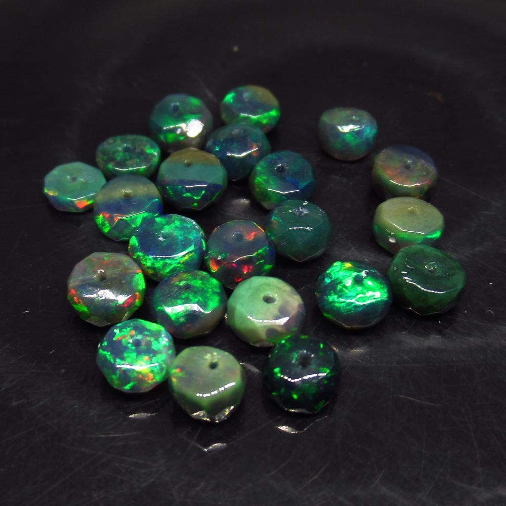 7.08 Ct Natural 22 Drilled Faceted Fire Black Opal: No Reserve! Title: 7.08 Ct Natural 22 Drilled Faceted Fire Black Opal Beads Stone Clarity: Translucent Gemstones: Natural Faceted Black Opal Beads Carat Weights: 7.08 Size/Dimensions: 4.60 to 5.10 mm 