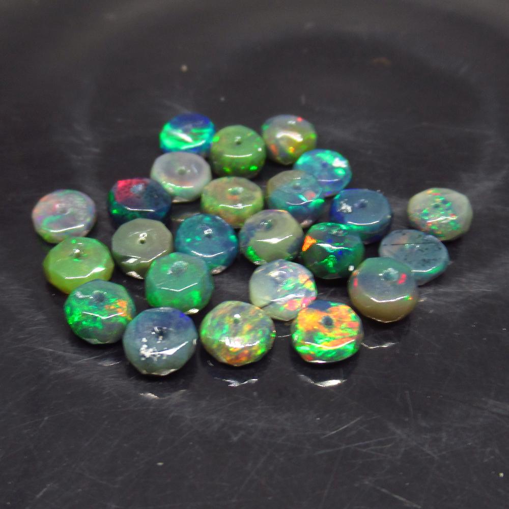 5.89 Ct Natural 24 Drilled Faceted Fire Black Opal: No Reserve! Title: 5.89 Ct Natural 24 Drilled Faceted Fire Black Opal Beads Stone Clarity: Translucent Gemstones: Natural Faceted Black Opal Beads Carat Weights: 5.89 Size/Dimensions: 4.20 to 4.70 mm 