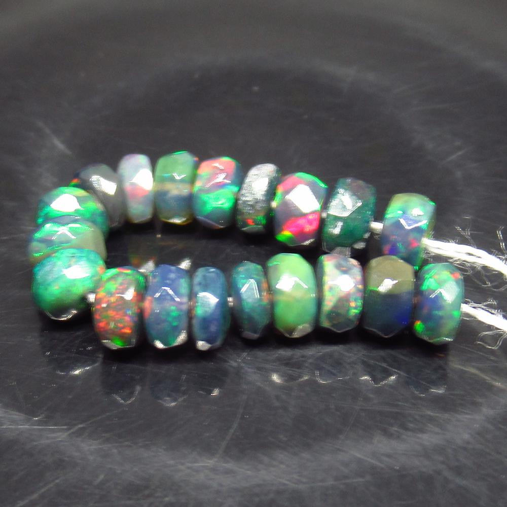 3.93 Ct Natural 19 Drilled Faceted Fire Black Opal: No Reserve! Title: 3.93 Ct Natural 19 Drilled Faceted Fire Black Opal Beads Stone Clarity: Translucent Gemstones: Natural Faceted Black Opal Beads Carat Weights: 3.93 Size/Dimensions: 4.10 to 4.50 mm 