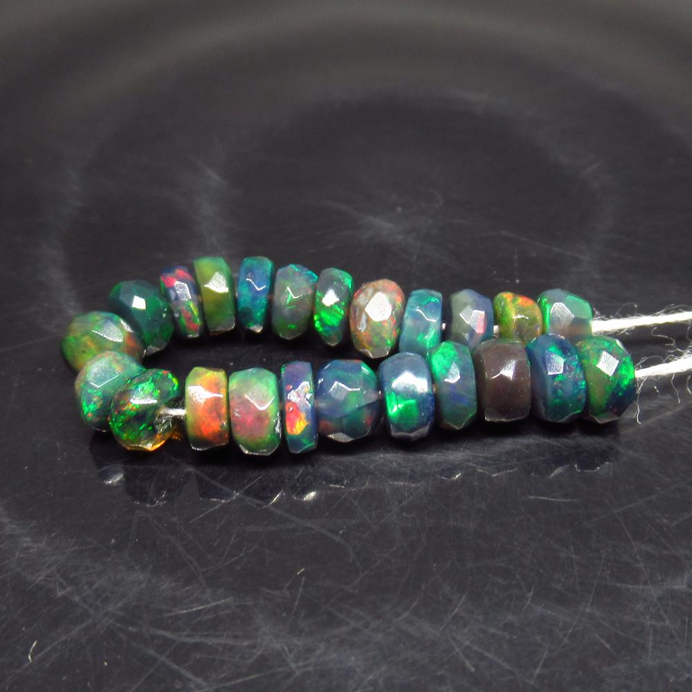5.04 Ct Natural 23 Drilled Faceted Fire Black Opal: No Reserve! Title: 5.04 Ct Natural 23 Drilled Faceted Fire Black Opal Beads Stone Clarity: Translucent Gemstones: Natural Faceted Black Opal Beads Carat Weights: 5.04 Size/Dimensions: 4.00 to 4.40 mm 