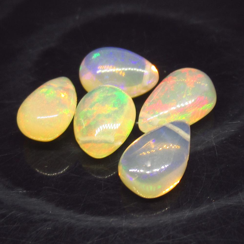5.09 Ct Natural 5 Drilled Pear Multi-Color Fire Opal (1 of 2)