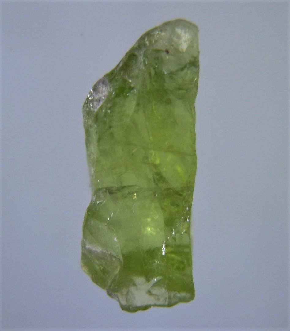 1.1 CT CLEAR PERIDOT - UNTREATED GEMSTONE: No Reserve! Title: 1.1 CT CLEAR PERIDOT - UNTREATED GEMSTONE Origin: Suppat, Kaghan Valley, Kohistan, Pakistan Size: 0.94x0.36x0.33 cm / 0.22 gram Additional Information: clear, green peridot Shipping