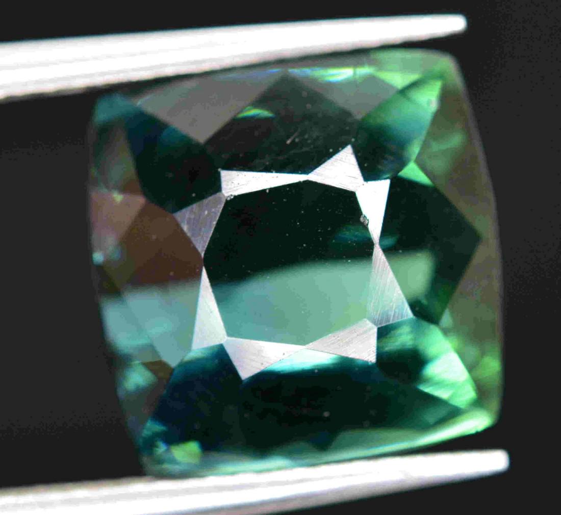4.5 Carats Beautiful Cushion Cut Blu Green: Title: 4.5 Carats Beautiful Cushion Cut Blu Green Tourmaline~9x9x6 MM Gemstones: Tourmaline Carat Weights: 4.5 Carats Size/Dimensions: 9x9x6 MM Additional Information: Heated Reserve: 80 Shipping: Do