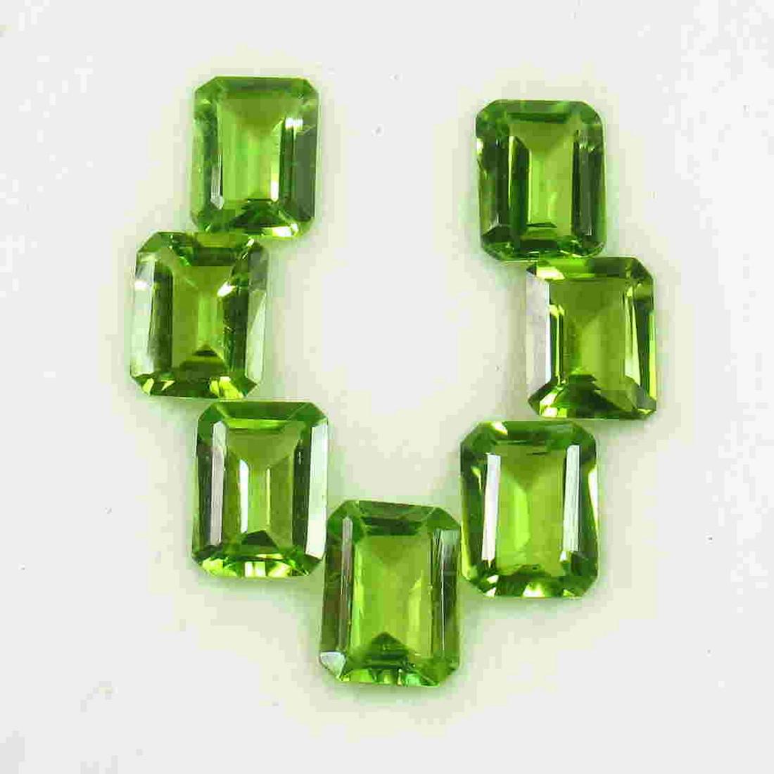 12.47 Ctw Natural 7 Pakistan Peridot Octagon Necklace: Title: 12.47 Ctw Natural 7 Pakistan Peridot Octagon Necklace Set Stone Clarity: VVS Gemstones: Peridot Carat Weights: 12.47 Size/Dimensions: 8.00 x 6.10 x 4.40 mm / 7 PC's Additional Information: Top 