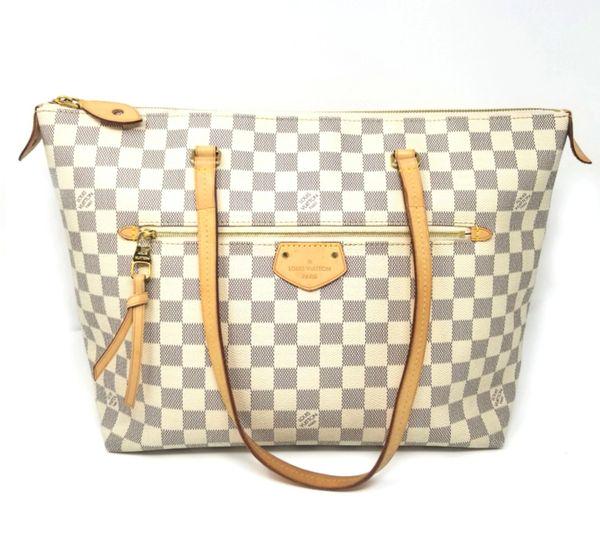 Louis Vuitton Iena MM Damier Azur Shoulder Bag: We offer this Louis Vuitton Iena Tote Damier MM. This Iena bag is crafted from damier azur coated canvas with the blue and white checkerboard design. This authentic Louis Vuitton Iena MM bag is crafte