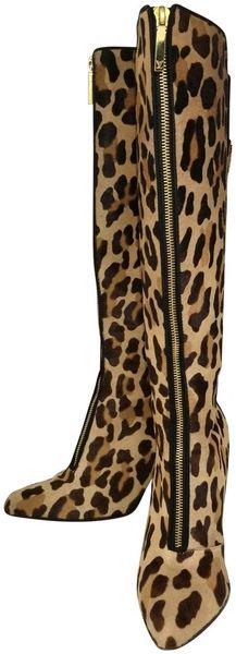 Louis Vuitton Leopard Print Pony Hair Tall Stiletto: Comes With Certificate of Authenticity Size 38, 8 US Sizing, Made in Italy Measurements: Circumference 14", Shaft 14", Heels 4" Condition is good Used with scuffs on soles and toes, fraying on pony ha