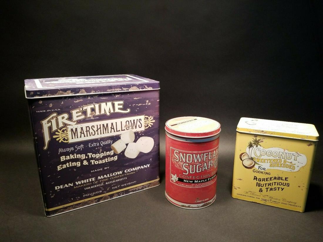 Set of 3 Advertising Tin Boxes Marshmallow Sugar: The large tin is 11 3/4" tall x 12" long x 8" wide The round tin is 7 7/8" tall x 5 1/2" wide The small tin is 7" long x 3 3/4" wide x 7 7/8" tall Great set of reproduction food tins! These are labele