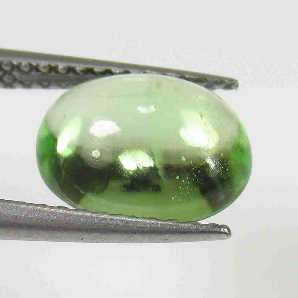 2.63 Ctw Natural Pakistan Peridot Oval Cab: No Reserve! Title: 2.63 Ctw Natural Pakistan Peridot Oval Cab Color/Clarity: Transparent :Gemstone: Peridot Carat Weights: 2.63 Size/Dimensions: 9.60 x 7.70 x 4.30 mm Additional Information: Top Class