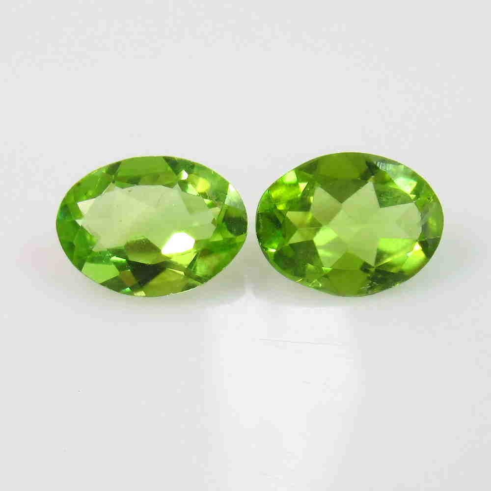 2.71 Ctw Natural Pakistan Peridot Oval Pair: No Reserve! Title: 2.71 Ctw Natural Pakistan Peridot Oval Pair Color/Clarity: VVS :Gemstone: Peridot Carat Weights: 2.71 Size/Dimensions: 9.00 x 7.00 x 3.40 mm / 2 PC's Additional Information: Top Cla