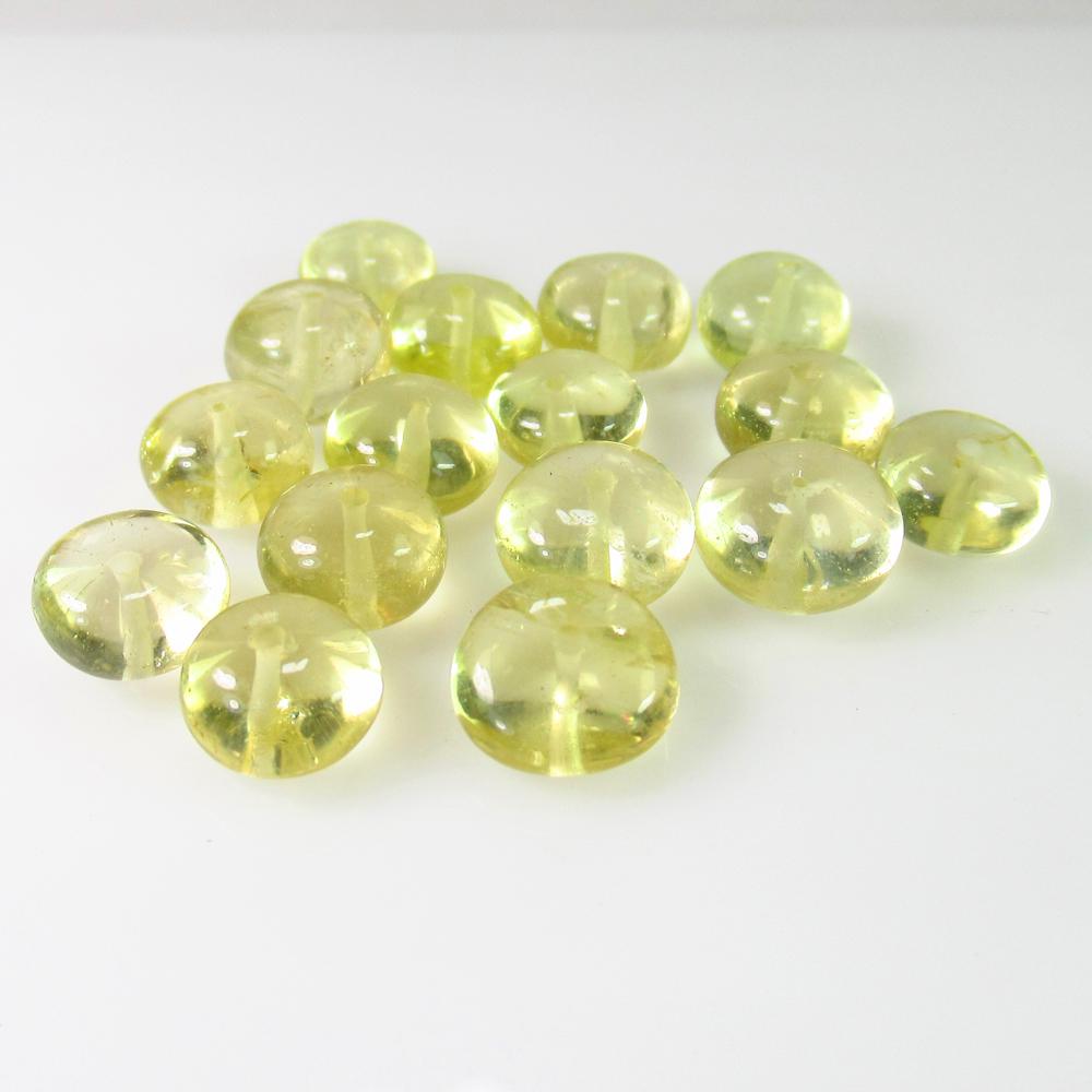42.90 Ct Natural 16 Lemon Quartz Drilled Round Beads: No Reserve! Title: 42.90 Ct Natural 16 Lemon Quartz Drilled Round Beads Color/Clarity: Transparent Gemstone: Natural Lemon Quartz Beads Carat Weight: 42.90 Size/Dimensions: 8.00 - 9.00 mm / 16 PC's Ad