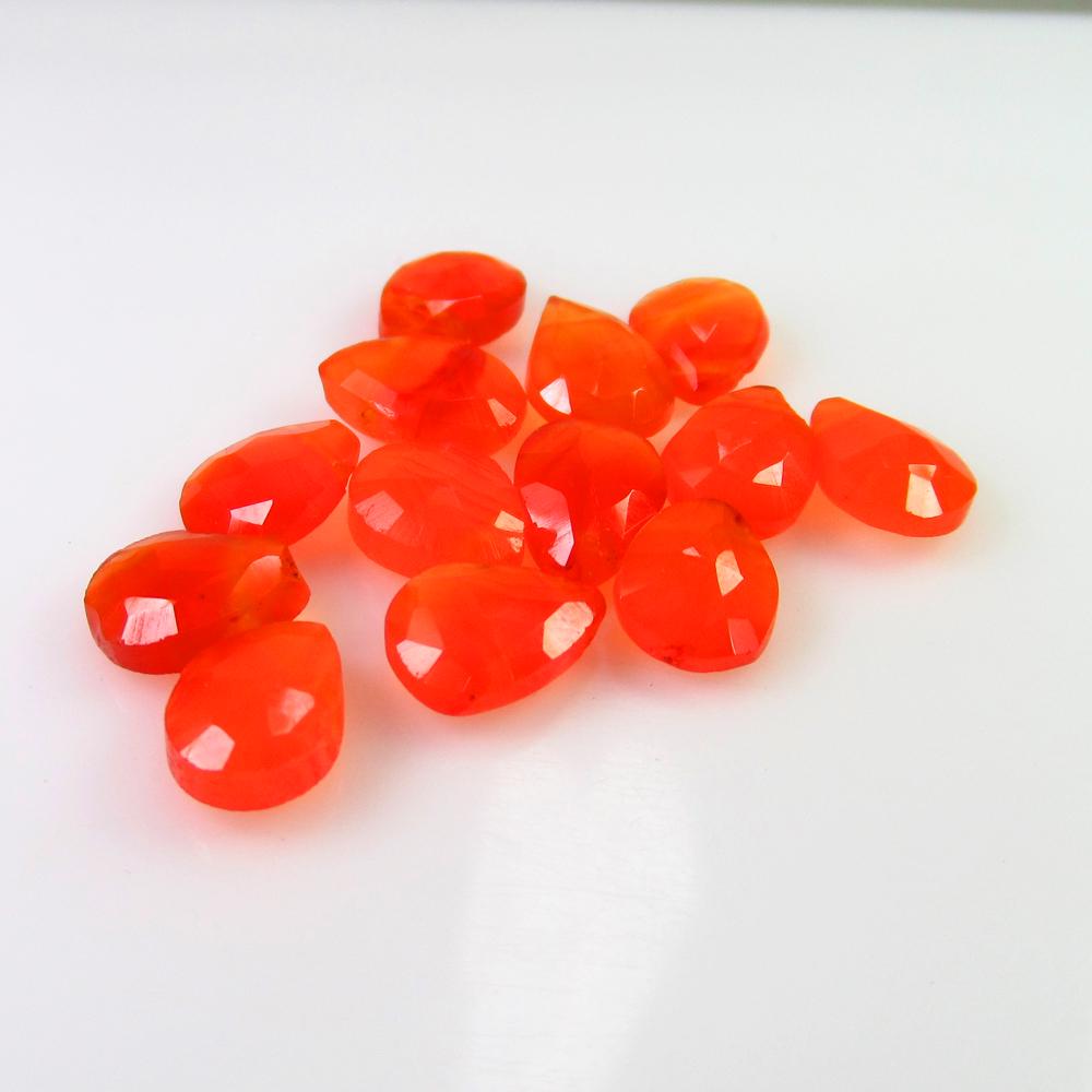 17.84 Ct Natural 13 Orange Carnelian Drilled Pear Beads: No Reserve! Title: 17.84 Ct Natural 13 Orange Carnelian Drilled Pear Beads Color/Clarity: Transparent Gemstone: Natural Carnelian Beads Carat Weight: 17.84 Size/Dimensions: 9.0x6.3 - 9.2x6.1 mm / 13 P