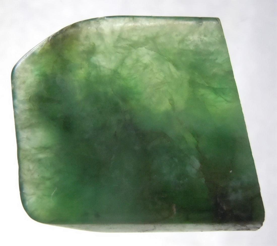 15.05 CT GENUINE JADEITE JADE: No Reserve! Title: 15.05 CT GENUINE JADEITE JADE Origin: Hpakant, Kachin State, Myanmar Size: 1.8x1.7x0.35 cm / 3.01 gram Description: dark green, untreated, polished jade jadeite. one natural crack S