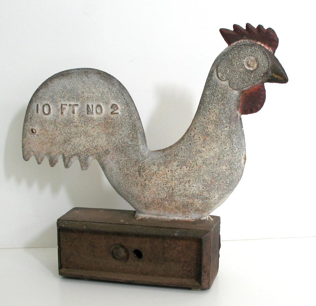 Early cast iron rooster windmill weight. (1 of 5)