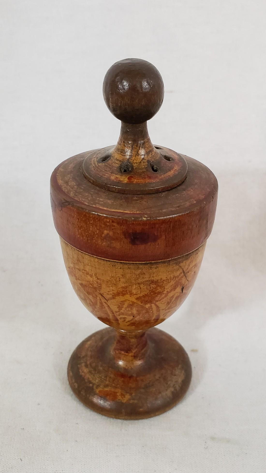 Turned and painted treen sand castor. Mid 19th cntury.: Title: Turned and painted treen sand castor. Mid 19th cntury. Dimension: 4 1/2" tall x 1 3/4" diameter Provenance:Pa origin. Very well turned with red paint accents. No cracks or chips. Wear commensur