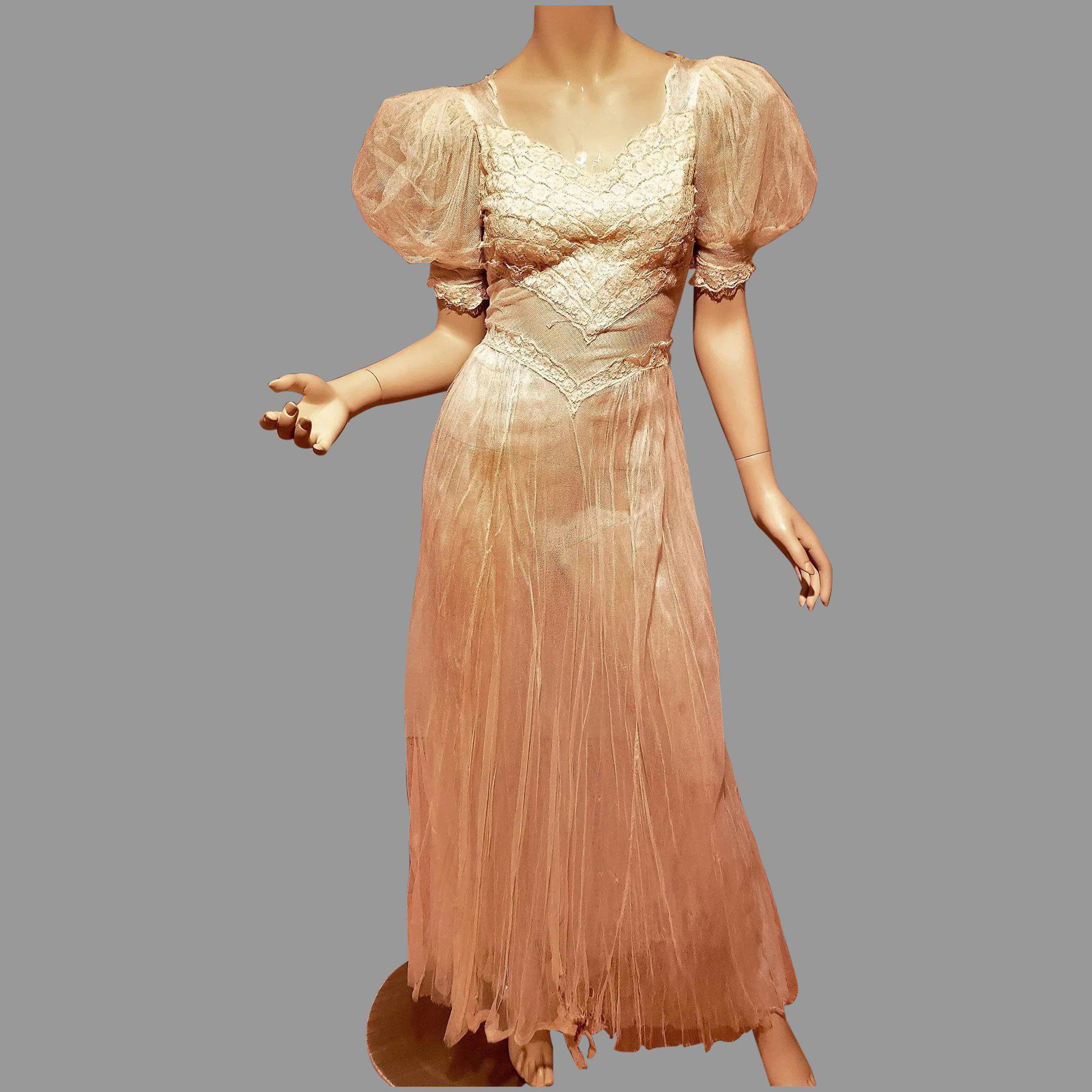 Antique Circa 1890's tulle lace Wedding/Garden dress: This one is a rare find from the late 19th Century /Edwardian the dress is made of layers of delicate Tulle with handmade lace that is exquisite. The hemline has horses hair. The dress is in very good