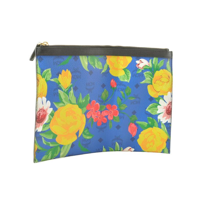 MCM Flower Pattern Novelty: Brand: MCM Model: Flower Pattern Novelty Color: Blue Material: Canvas Dimensions: W31 x H22cm Serial number: NA Country of origin: Korea Condition: B - good condition. May have some signs of wear. Ple