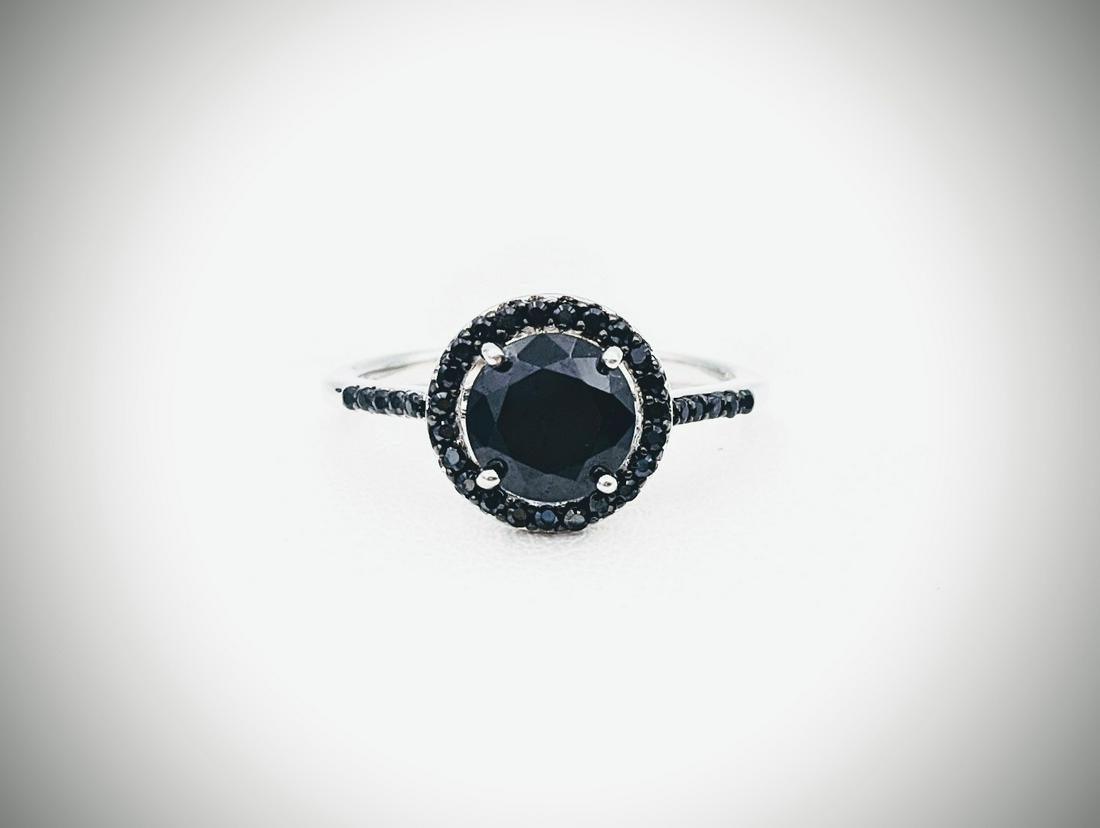 Sterling Silver Sz 7 Spinel Ring: Title: Sterling Silver Sz 7 Spinel Ring Metal Purity: 925 Sterling Silver Gemstones: Spinel Carat Weight: 1 Round Spinel at 7mm, and 23 Round Spinel at 1mm each. Size/Dimensions: 7 Reserve: $35.00 Shi