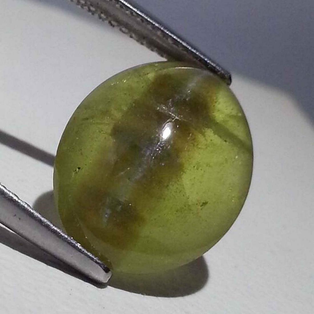 Natural Chrysoberyl Cat's Eye 9.98 ct: No Reserve! Title: Natural Chrysoberyl Cat's Eye 9.98 ct Color/Clarity: Opaque Gemstones: Loosegemstone Carat Weights: 9.98 Size/Dimensions: 15.80 x 12.70 x 5.00 Additional Information: Oval - Srilank
