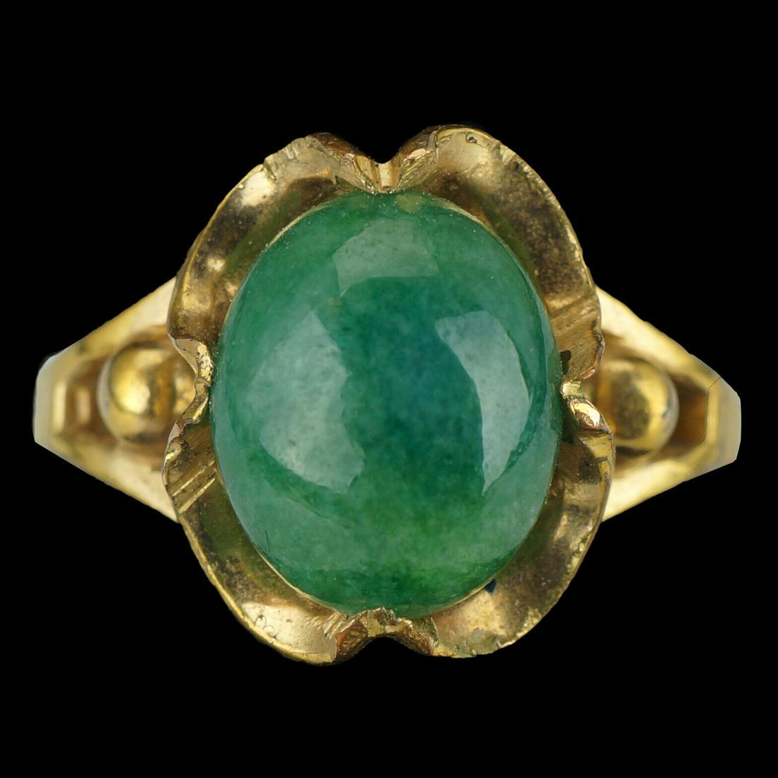 Vintage 10 k GF Nephrite Cocktail Ring Size 6: The jade cabochon cocktail ring has a fancy 10k gold filled mount with a split shank that frames and accentuates the very pretty medium green jade stone. The 10 mm tall oval cabochon has considerable 