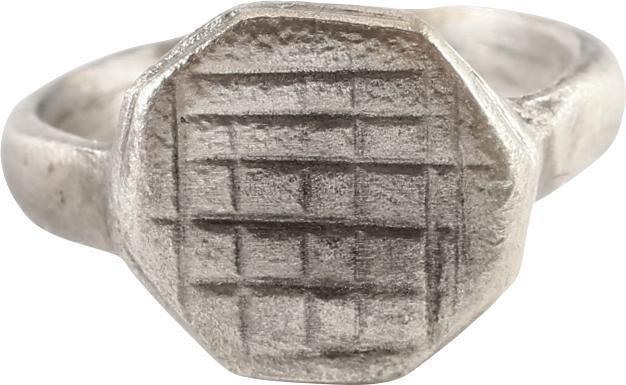 MEDIEVAL EUROPEAN RING 750-1100 AD: The Pilgrim and Crusades period. Silvered bronze, size 5 ½. Rounded face 3.0mm slightly flaring to the shoulders. The octagonal bezel with a lattice pattern. The lattice was a popular motif and possi