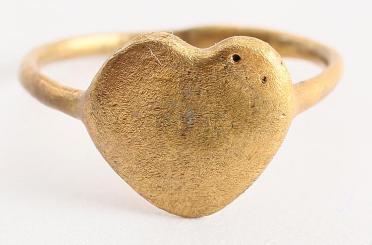 ANCIENT VIKING HEART RING C.850-950 JEWELRY AD. Size 7.: Size 7. Oval rounded face band, 3.4mm, slightly broadened and thickened at the bottom. Fine form heart bezel, utilizing the natural (uncusped) form. The cusped top form was used toward the end of the 