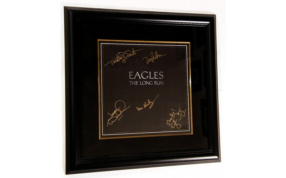 The Eagles "The Long Run" 1979: Title: The Eagles "The Long Run" 1979 Materials: Black Frame with UV Glass and Suede Matting Dimension: 21 1/2 x 21 1/2 Inch Provenance:Signed: Don Felder, Thanks! Glen Frey, Don Henley, Joe Walsh and