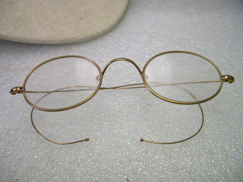 True Vintage 12kt G.F. Wire Rim Glasses, Stevens & Co.: Vintage - Stevens & Co. Oval Wired Rim Glasses - antiques - early 1900's or older. They are in very good condition - the gold filled finish is very good. They are appx. 4" from the hinge on each side