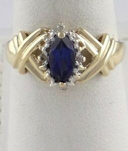 LADIES 10K YELLOW GOLD 1/2ct 9x4mm SYNTHETIC SAPPHIRE (1 of 1)
