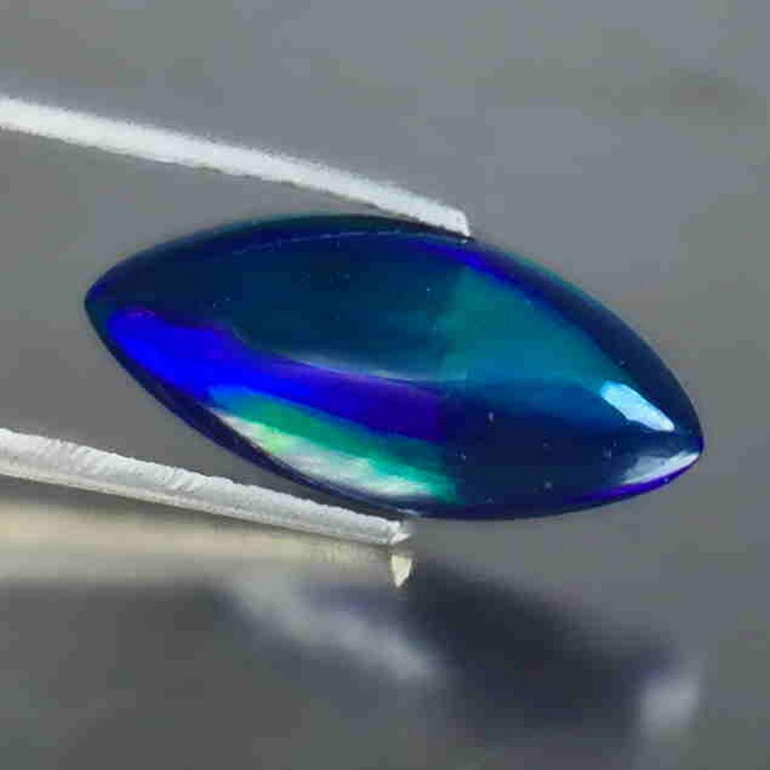 2.45Cts Natural Multi color Black Opal Marquise: Title: 2.45Cts Natural Multi color Black Opal Marquise Cabochon loose gemstone NL103 Brand: MRS GEMS Carat Weights: 2.45 Size/Dimensions: 17.30x7.20x3.60 MM Reserve: $20.00 Shipping: Domestic: Flat-ra