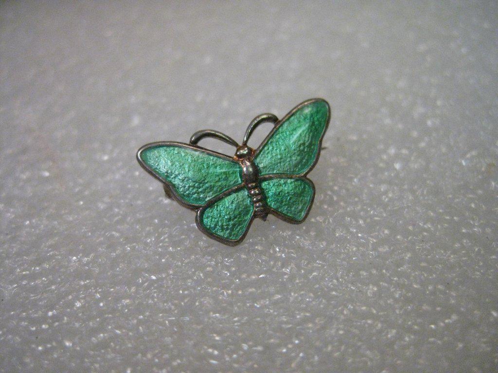 Vintage Sterling Silver Guilloche Butterfly Brooch,: Vintage Sterling Silver Guilloche Butterfly Brooch, somewhat rare, signed V.B. for Volmer Bahner, Denmark. This is a pacific green color. It is a petite butterfly that is 3/5" wide and about 2/3" tall